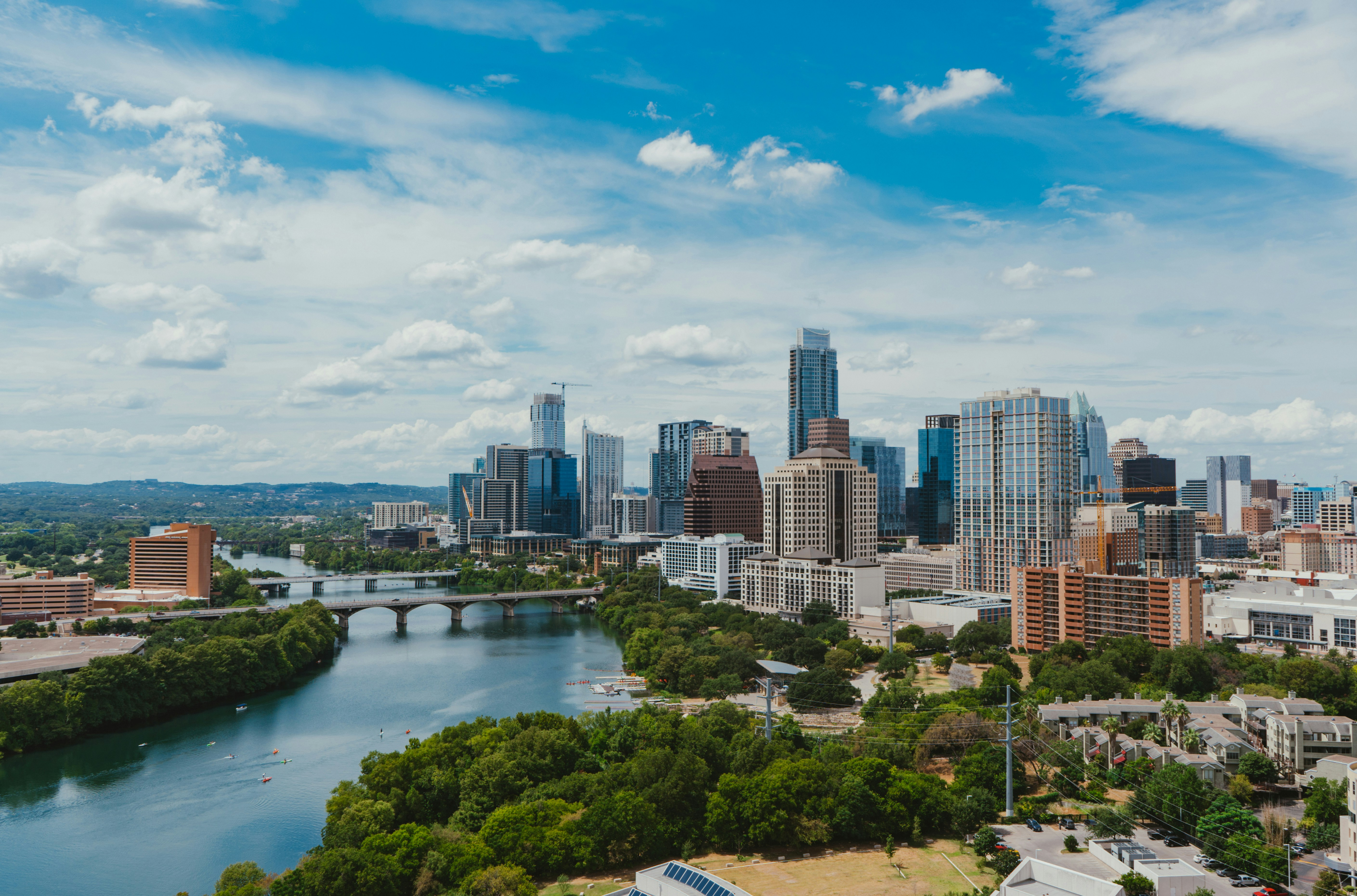 Austin, Texas skyline featuring the iconic downtown buildings and Colorado River, showcasing the city's vibrant urban landscape and natural beauty