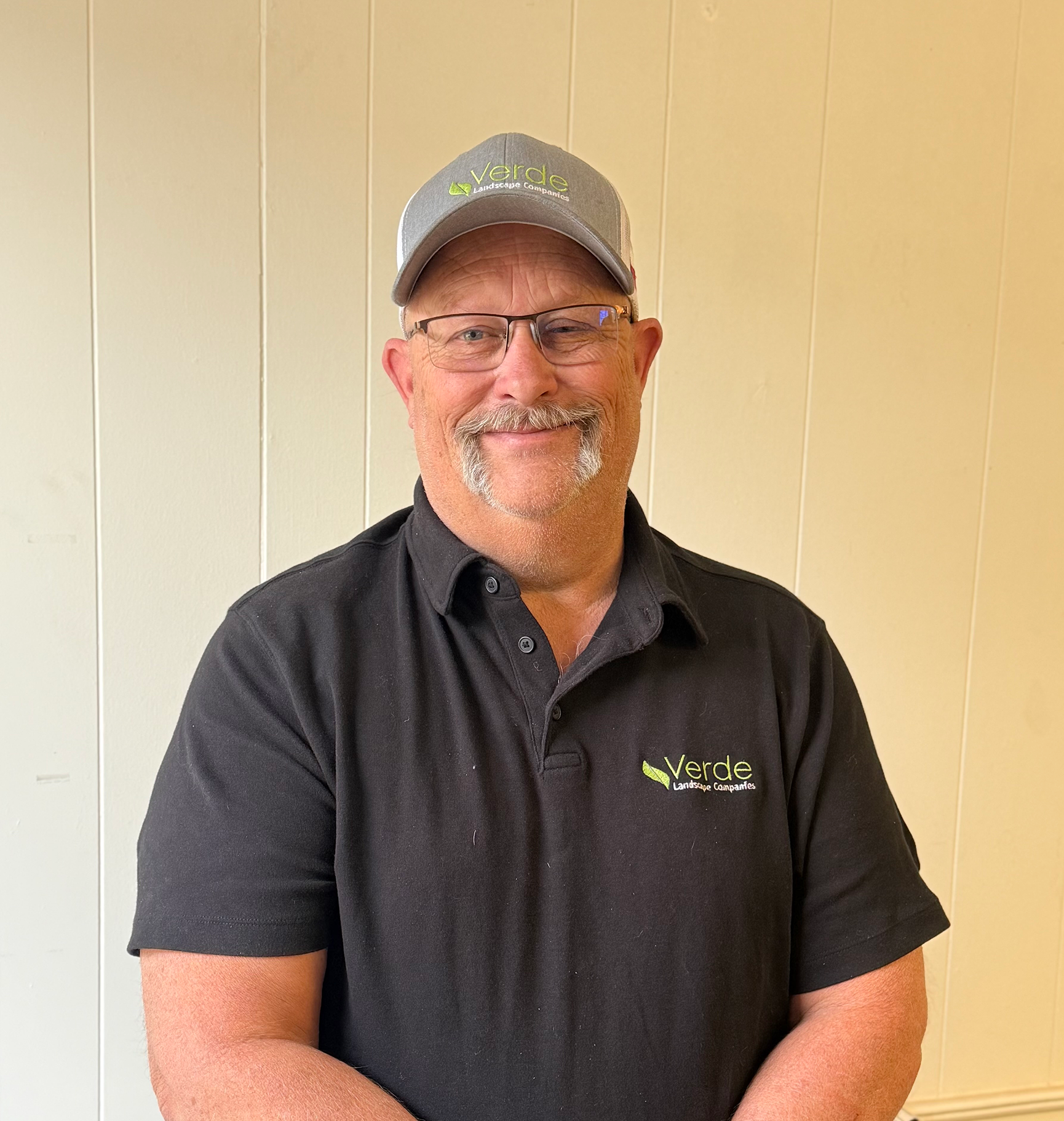 Professional headshot of Brandon, Verde Landscape's ????, smiling warmly in work clothing.
